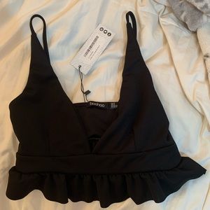 4 black tank tops
